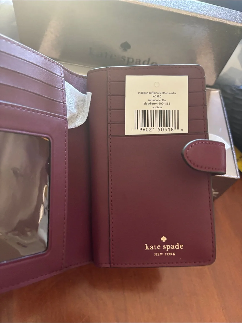 kate spade burgundy and gold zip-around wallet
